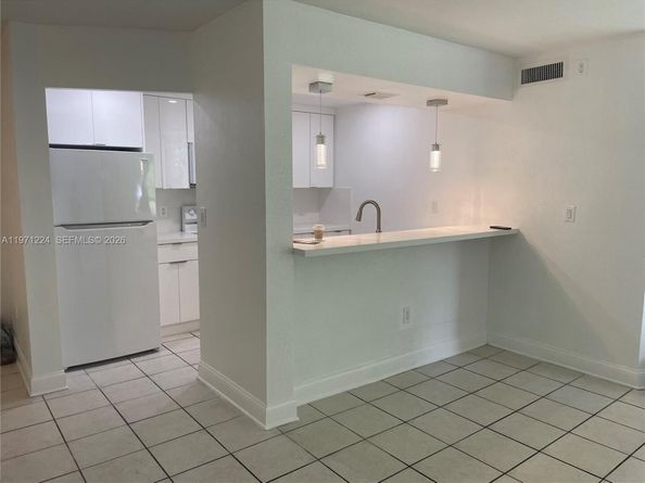 7165 NW 186th St A104, Hialeah FL 33015