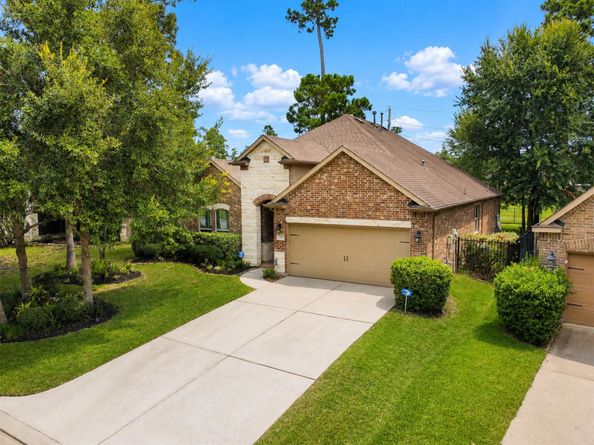 79 W Wading Pond Circle, The Woodlands TX 77375