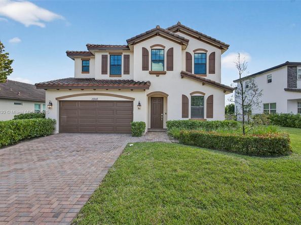 1310 Whitcombe Dr, Royal Palm Beach FL 33411