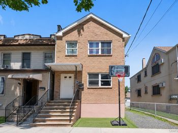 6107 Maspeth Avenue