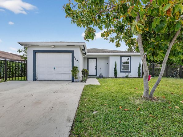 1691 W 26th Court, Riviera Beach FL 33404