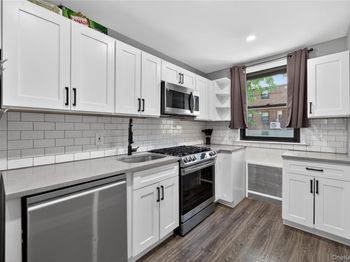 56-21 Douglastion Parkway