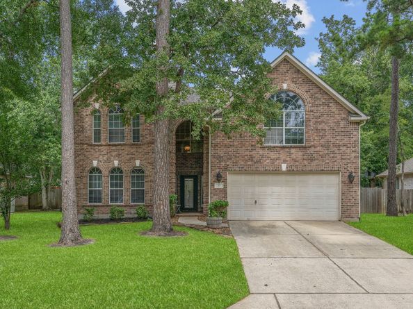 23 Murmuring Creek Place, Conroe TX 77385