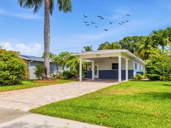 735 NE 34th Court