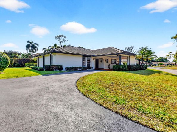 440 Pine Villa Drive, Atlantis FL 33462