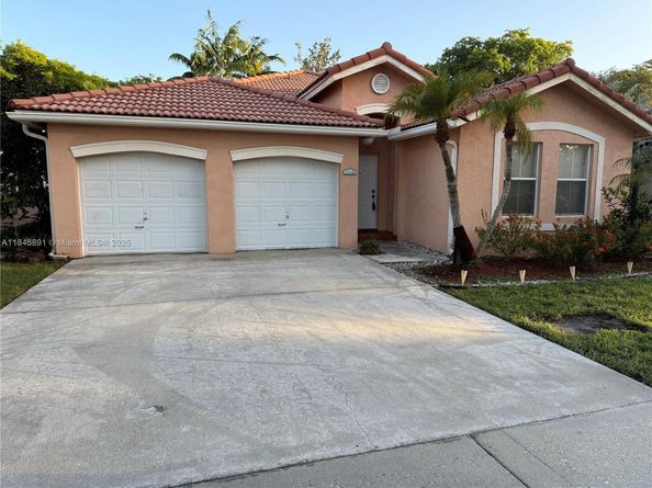 14146 S Cypress Cove Cir, Davie FL 33325