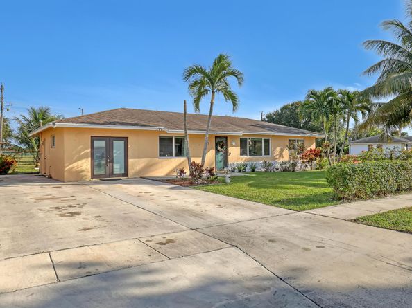 1476 N Mangonia Drive, West Palm Beach FL 33401