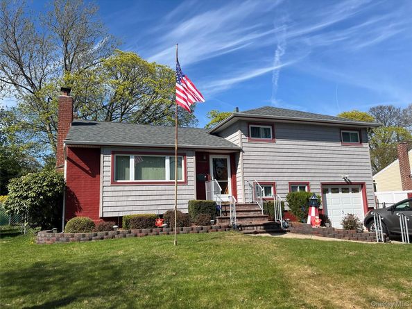 65 Thoreau Road, North Babylon NY 11703