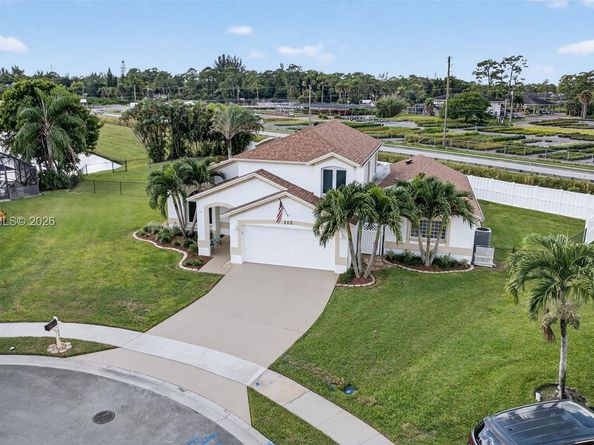 112 Camelot Ct, Royal Palm Beach FL 33411