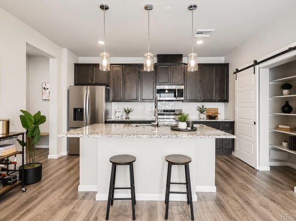 6153 N Ceylon Street 10303, Denver CO 80249
