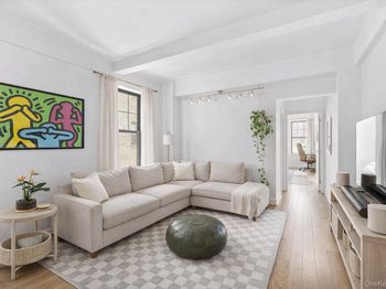 141 E 3RD Street
