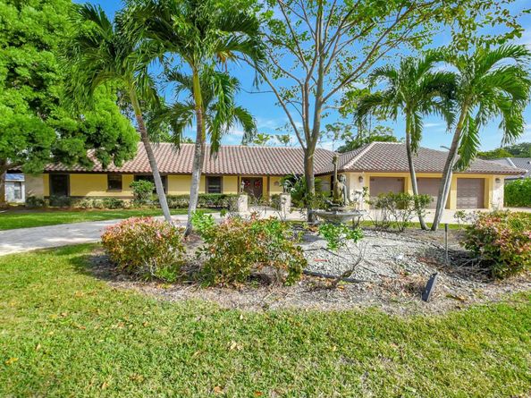 581 S Country Club Drive, Atlantis FL 33462