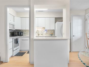 7110 S Gaylord Street