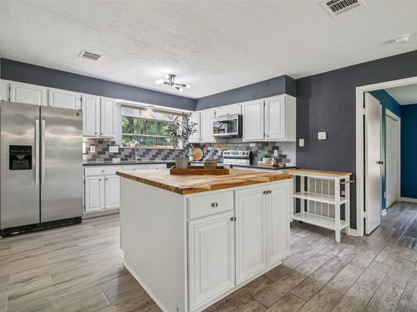 5210 Creek Shadows Drive, Houston TX 77339