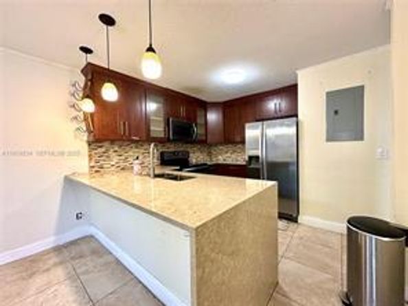 3490 Deer Creek Palladian Circle, Deerfield Beach FL 33442