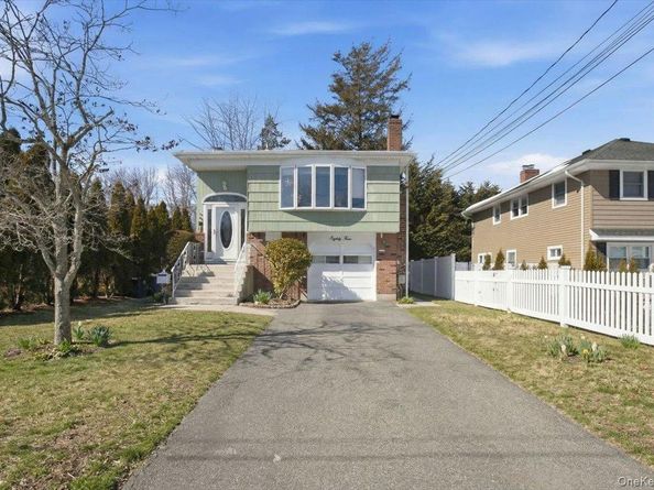 85 Unqua Road, Massapequa NY 11758