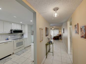 3186 Via Poinciana 203