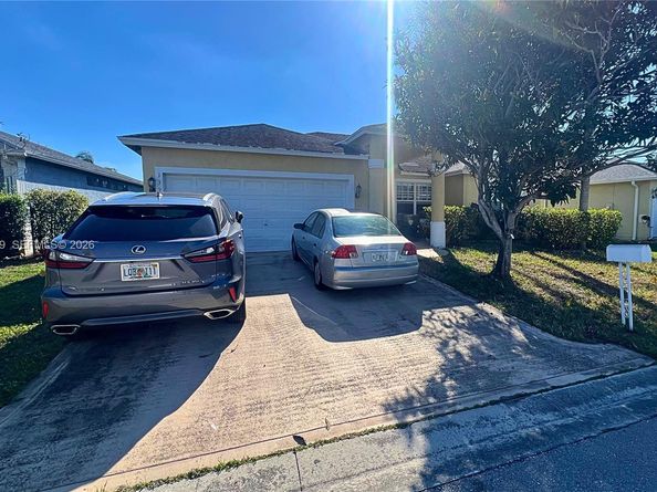 1327 Monteray Way, Green Acres FL 33413