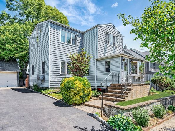 211 Saint Marks Place, East Meadow NY 11554