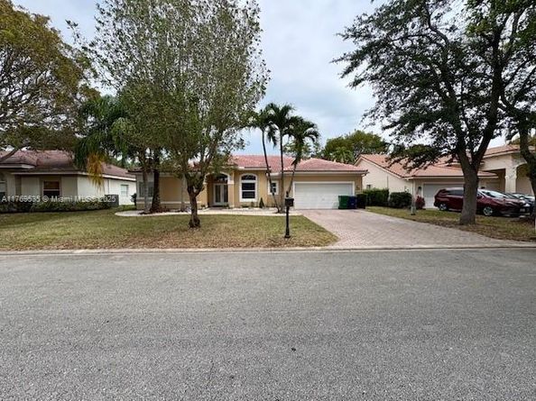 10261 NW 54th Pl, Coral Springs FL 33076