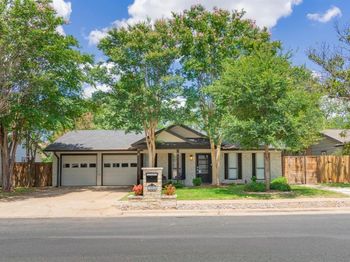 7002  Whispering Oaks Drive 