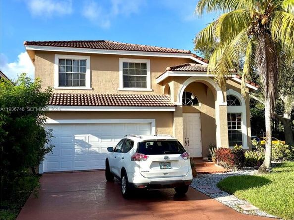 306 NW 115th Way, Coral Springs FL 33071