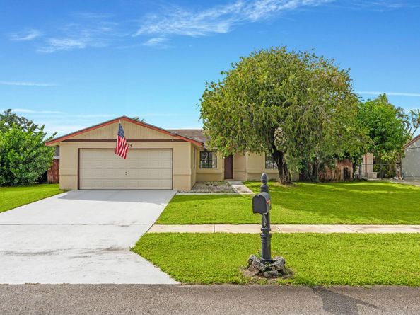 1403 Donwoods Lane, Royal Palm Beach FL 33411