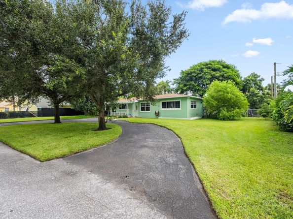 6400 Carambola Circle, West Palm Beach FL 33406