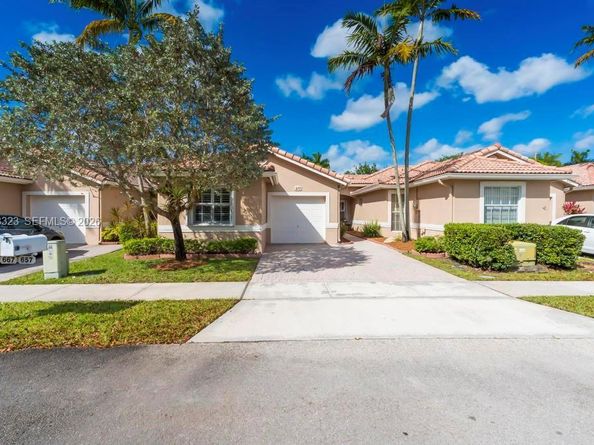 677 NW 129th Way, Pembroke Pines FL 33028